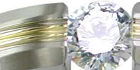 Example of a titanium engagement ring with gold inlay